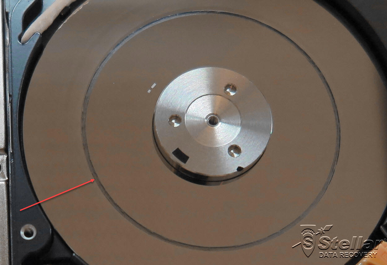 grinded magnetic data layer of a hard drive disk as a result of a wrongly deployed logical data recovery technique